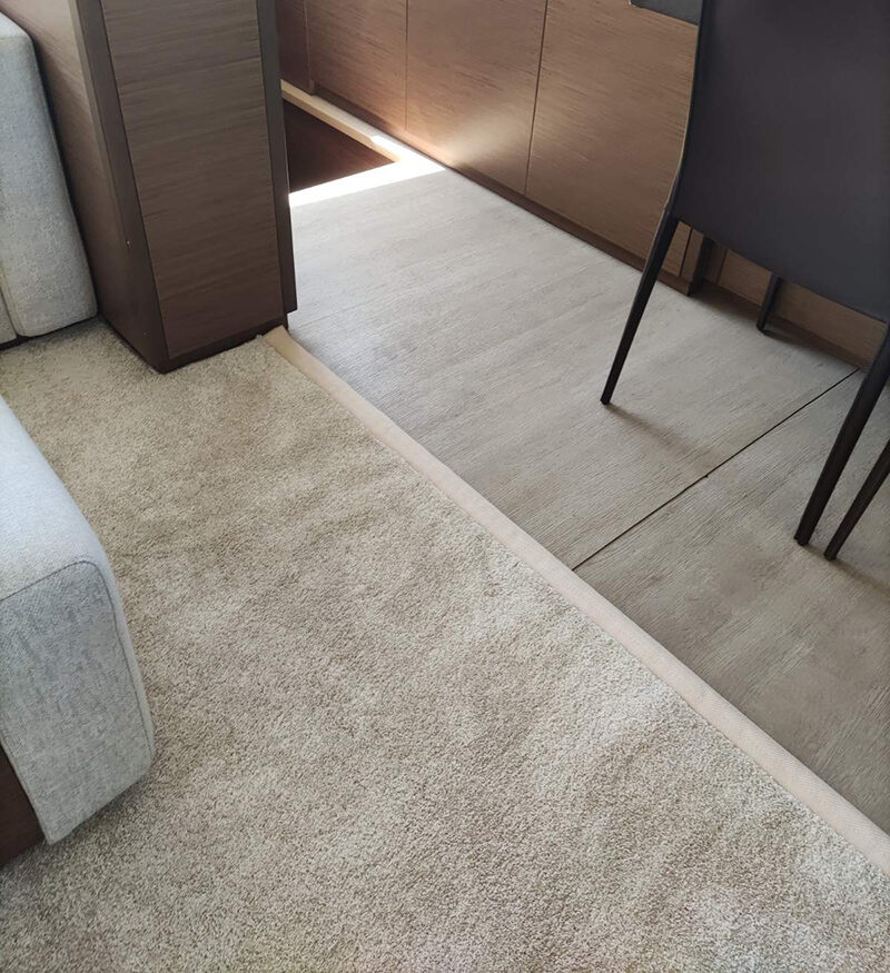 Carpet installation on a catamaran.